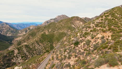 Flight-around-the-San-Gabriel-Mountains-to-reveal-the-winding-Angeles-Crest-Highway-and-scenic-byway