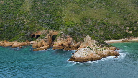 Featherbed-Nature-Reserve-with-iconic-sea-caves---Knysna-Heads,-Garden-Route