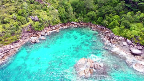 Mahe-Seychelles-Reveal-drone-shot-of-rocks-and-Indian-ocean