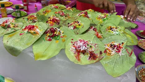 Close-up-shot-of-a-street-vendor-selling-paan-or-betel-leaves-in-his-shop-in-India