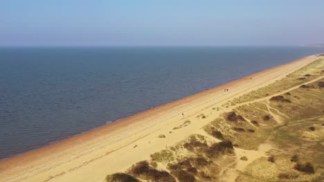 Aerial-View-of-Snettisham-sand-dunes,-beach-and-sea