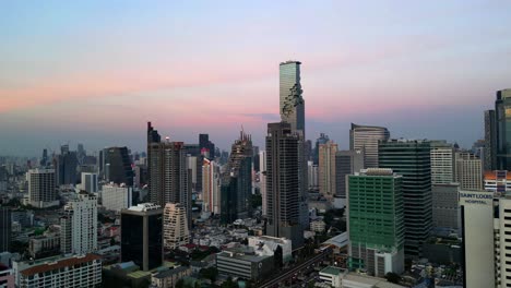 Drone-Shot-of-Mahanakhon-Tower-in-Bangkok,-Silom-area,-business-district,-downtown