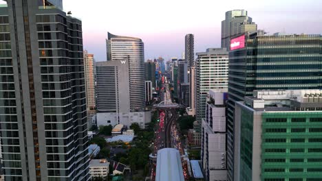 BTS-Skytrain-tracks-in-Silom-area-in-Bangkok-between-skyscrapers-in-the-business-district
