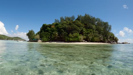 Seychelles,-St-Anne-marine-park,-boat-approaching-moyenne-island