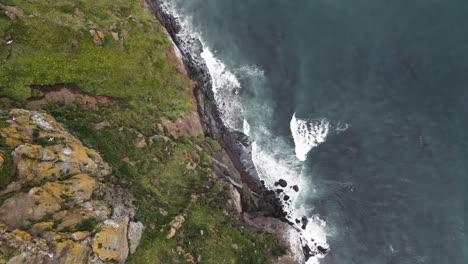 Drone-flight-over-rocks-along-the-ocean-,-Kamchatka