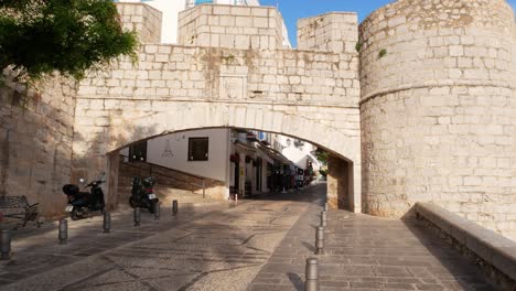 Tilt-down-shot-of-Sant-Pere-entrance-to-the-fortified-town-of-Peniscola