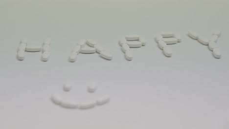 the-word-happy-spelled-with-white-pills