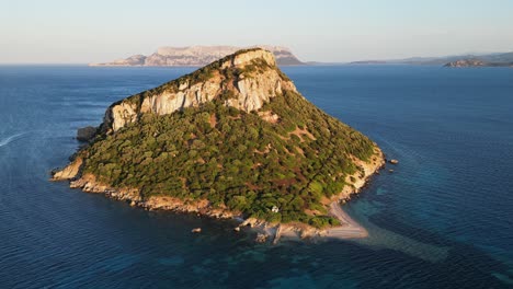 Figarolo-Island-during-twilight-in-Golfo-Aranci,-Sardinia,-Italy---4k-Aerial-Circling