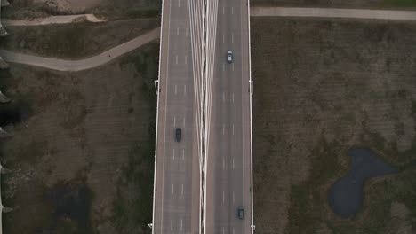 Birds-eye-view-of-cars-going-over-the-The-Margaret-Hunt-Hill-Bridge-in-Dallas
