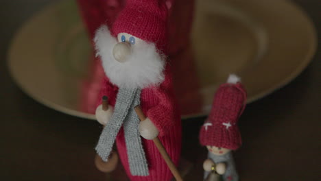 Close-Up-Tilt-Up-of-Two-Swedish-Gnomes