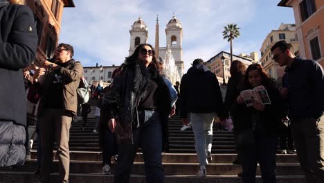 Spanish-Steps-in-Rome,-Italy-during-the-day-with-tourists-in-slow-motion