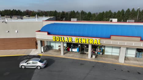 Descending-aerial-on-Dollar-General-discount-retail-store