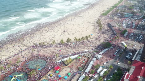 High-drone-shot-of-the-crowds-on-Durban-beachfront-in-South-Africa