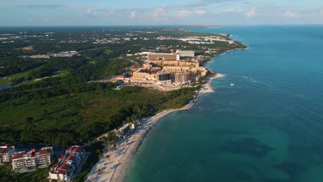 Aerial-View-Along-Coastline-Of-Playa-Paraiso-In-Tulum-With-Resort-Hotels-In-Distance