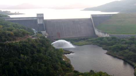 Early-morning-Drone-towards-a-dam-wall-releasing-water-in-South-Africa