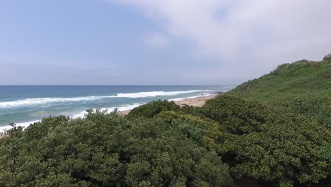 Drone-reveal-of-the-coastline-of-South-Africa-with-waves-and-the-Indian-Ocean