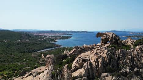 Bear-Rock-Viewpoint-at-Capo-d'-Orso-in-Sardinia,-Italy---4k-Drone-Aerial-Pedestal-Up