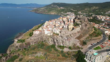 Castelsardo-castle-and-fortified-town-in-Sardinia,-Italy---4k-Drone-Aerial-Circling