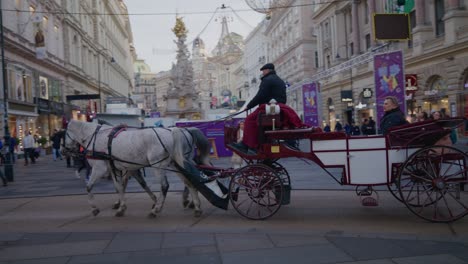 Tourist-enjoy-a-ride-on-a-horse-carriage-in-the-city-center-of-Vienna-on-New-Year's-day-2023