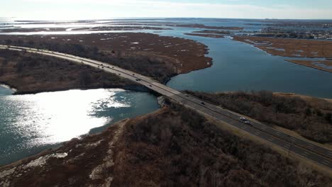 An-aerial-view-of-a-highway-on-Long-Island,-NY-on-a-sunny-day