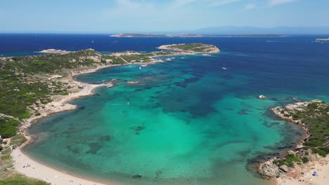 White-Sandy-Beach-and-Turquoise-Blue-Bay-at-La-Maddalena-Archipelago,-Sardinia,-Italy---Aerial