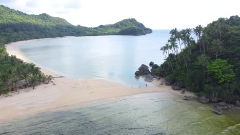White-Sand-Beach-Cove-with-lots-of-coconut-trees-in-the-Island