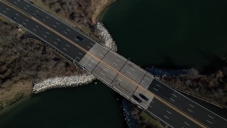 An-aerial-view-over-a-highway-on-Long-Island,-NY-on-a-sunny-day