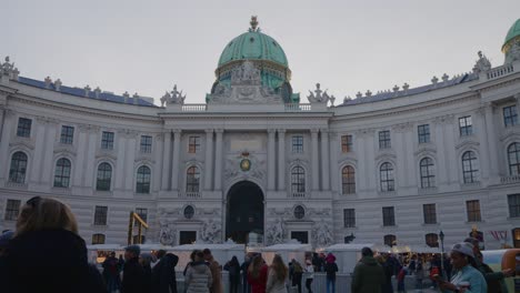 Tourist-enjoy-the-Christmas-market-in-front-of-the-imperial-palace-in-the-city-center-of-Vienna-on-New-Year's-day-2023