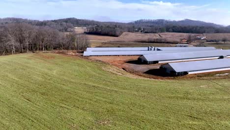 aerial-push-in-to-chicken-farm-in-wilkes-county-nc,-north-carolina