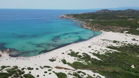 Long-White-Sandy-Spiaggia-La-Liccia-Beach-at-Costa-Paradiso,-Sardinia,-Italy---Aerial-4k