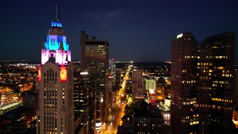 Aerial-Downtown-Columbus-at-Night---Leveque-Tower,-Ohio-Statehouse-City-Lights