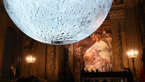 Lay-down-and-look-up-to-the-moon,-The-Painted-Hall-within-Old-Royal-Naval-College,-Greenwich,-London,-United-Kingdom