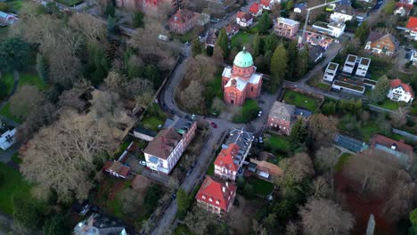 Aerial-drone-shot-of-Christuskirche-in-the-small-german-town-Lahr-in-Schwarzwald