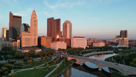 Aerial-golden-hour-city-skyline-pan-with-traffic---Columbus,-Ohio