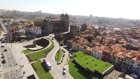 Portugal-Porto-aerial-video-city-centre-buildings-bridges-architecture-rooftop-4k-river-boat-ship-waterfront-bank-people-walking-red-yellow-green-blue-awesome