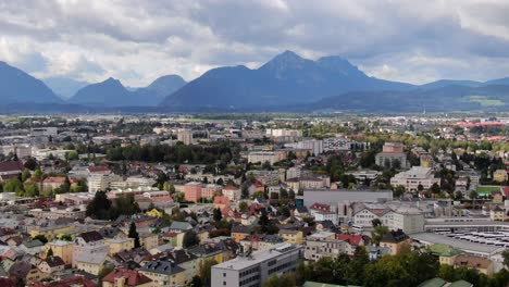 Soft-aerial-dolly-right-showing-beautiful-alps-and-city-of-Kuchljust-outside-Salzburg-Austria