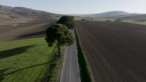 Italian-road-and-countryside-aerial-low-to-high