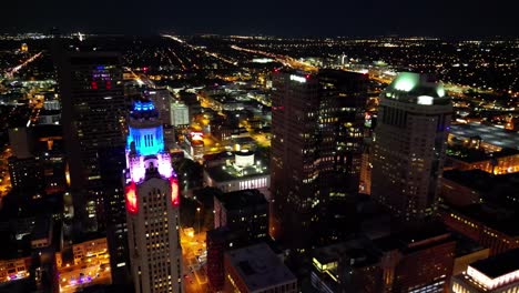 Night-Cityscape-Aerial-Shot-of-Leveque-Tower,-Ohio-Statehouse-and-Supreme-Court---Columbus,-Ohio
