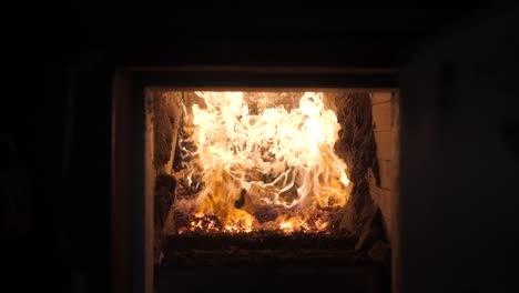 wood-burning-in-furnace,-wooden