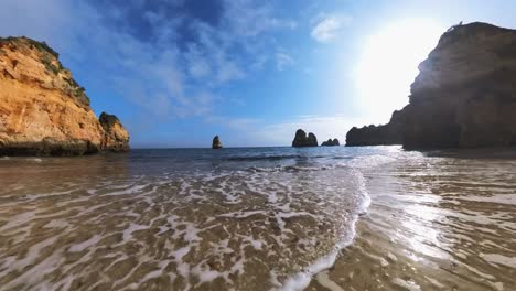 The-Ponta-da-Piedade-area-in-the-Lagos-region-of-Portugal-is-known-for-its-stunning-beauty,-including-its-beaches,-cliffs,-waves,-and-sea