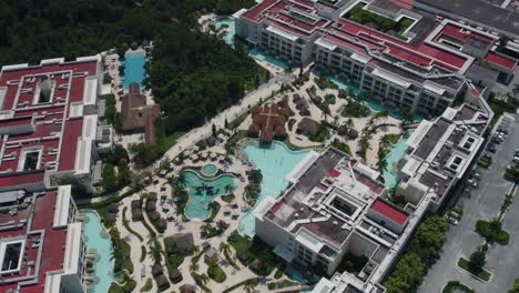 Aerial-view-of-the-Paradisus-Playa-del-Carmen,-a-resort-with-many-pools-perfect-for-families-on-vacation