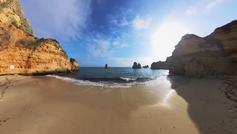 The-beaches,-cliffs,-waves,-and-sea-in-the-Lagos-region-of-Portugal,-particularly-in-the-Ponta-da-Piedade-area,-are-a-sight-to-behold-with-their-stunning-beauty
