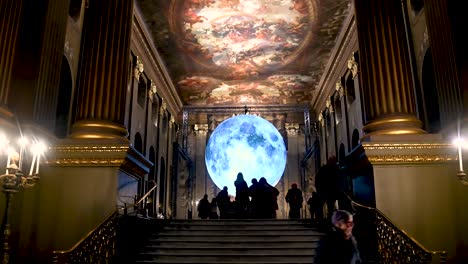 Looking-up-to-the-world-within-the-Painted-Hall,-Greenwich,-London,-United-Kingdom