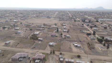Wide-aerial-drone-shot-over-an-informal-township-in-rural-South-Africa