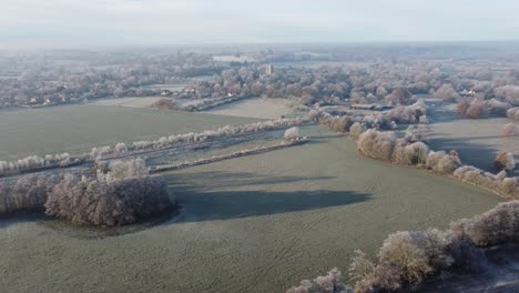 Drone-footage-flying-towards-Dedham-church-and-village-in-a-hoar-frost-early-in-the-morning
