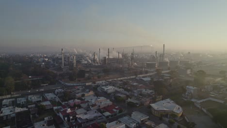 Aerial-shot-of-a-refinery-on-a-polluted-morning
