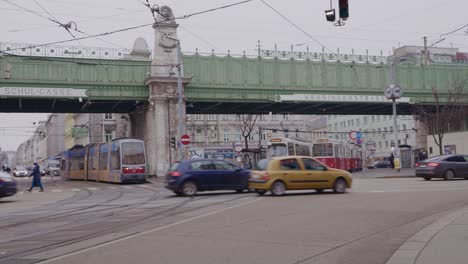 Traffic-around-the-stations-Fuchsthaller-Gasse,-Schul-Gasse-and-Waehringer-Strasse-in-central-Vienna-in-winter