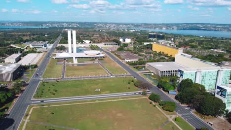 View-of-Brasilia,-Brazil,-showing-government-offices,-congress,-foreign-office-and-the-presidential-palace,-with-a-lake-on-the-background,-before-2022-presidential-elections