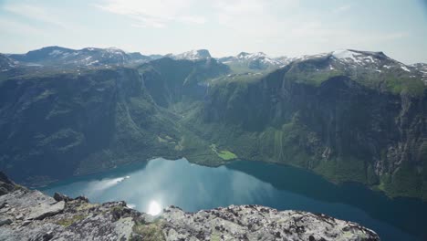 Beautiful-Mountain-Peaks-And-Clear-Blue-Lake-In-Katthammaren-Mountain-Norway---panning-wide-shot