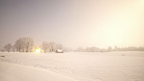 Timelapse-shot-of-white-snow-covered-landscape-along-rural-countryside-from-evening-to-night-with-star-movement-over-the-sky
